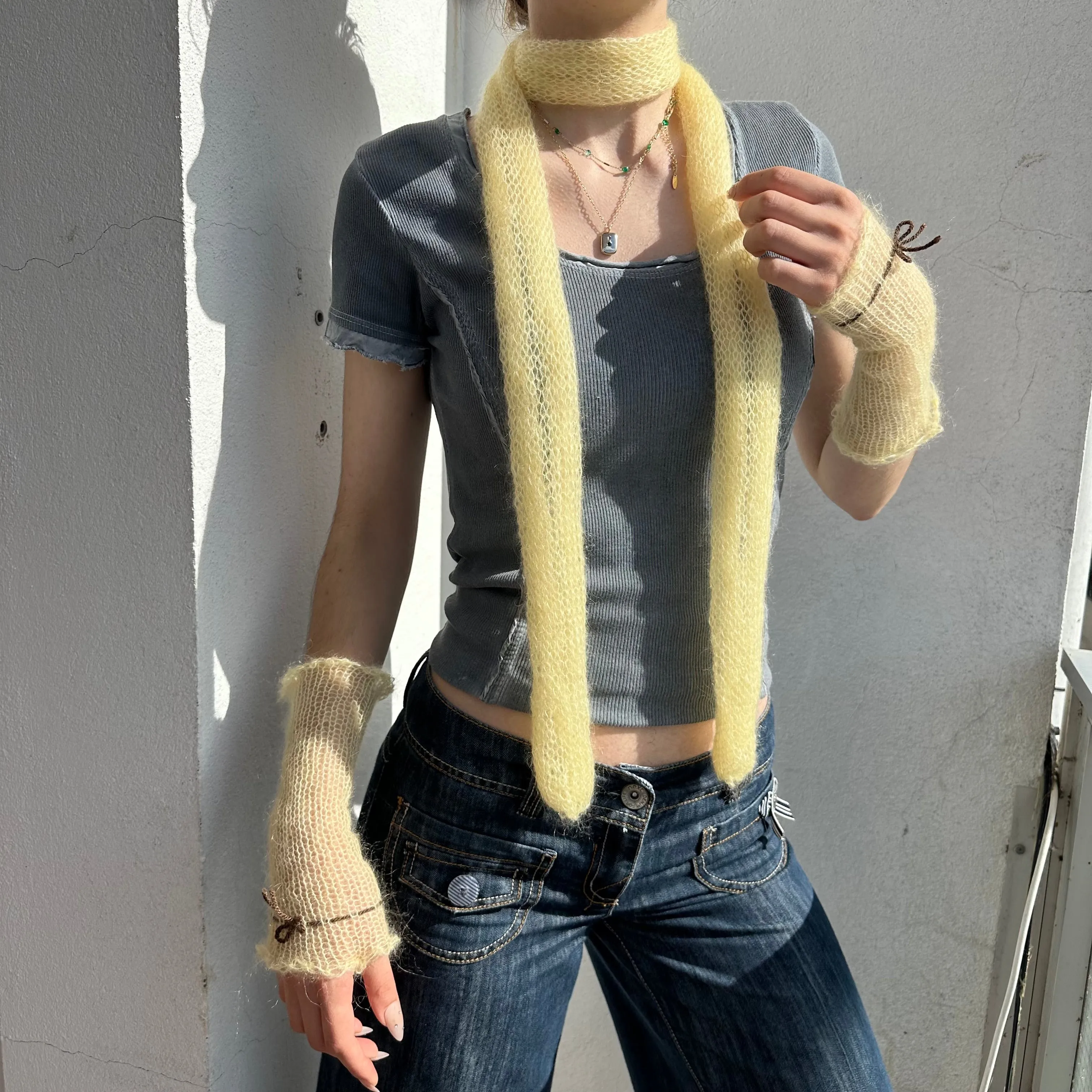 Handmade knitted mohair skinny scarf in light yellow