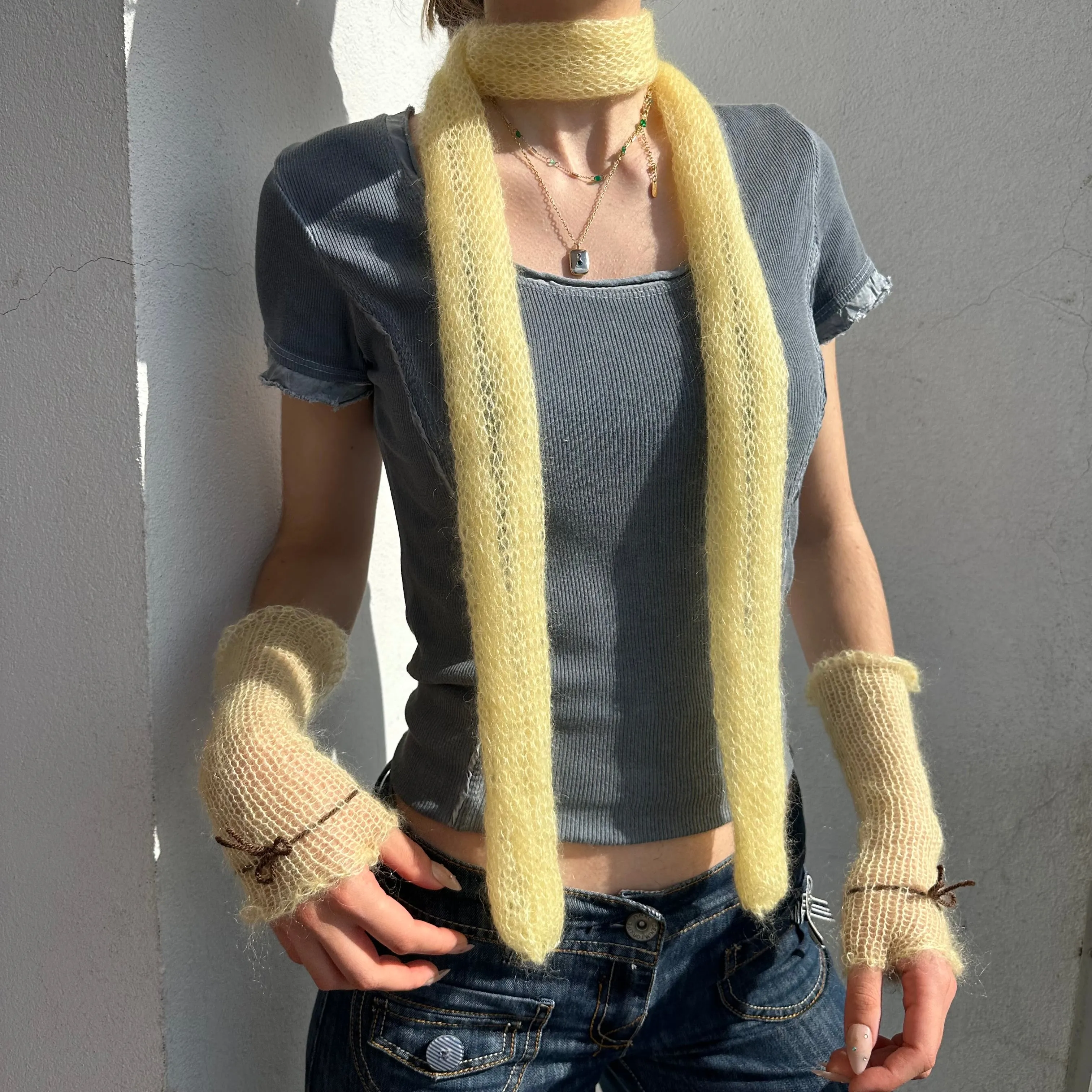 Handmade knitted mohair skinny scarf in light yellow